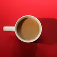 Coffee on red, saved as WebP